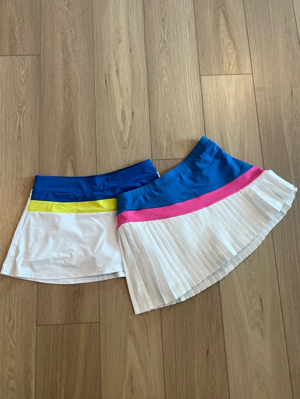 Original Penguin Blue and White Tennis Skirts with Pink and Yellow Trim - Size M